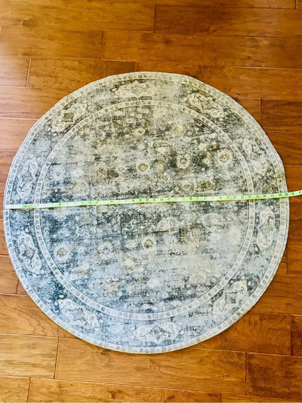Round Vintage-Style Rug in Greens